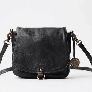 NWT gorgeous new black crossbody bag with dust bag. The Wanderer Travel Co.